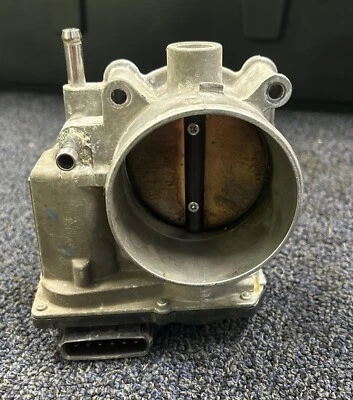 Cuerpo del acelerador de inyección de combustible usado se adapta a: Nissan Armada 2011 Foto 1 de 4