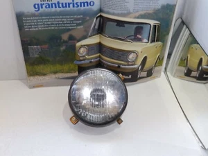 FIAT 124 SPECIAL T DEL 72 - FARO ABBAGLIANTE SX ORIGINALE ELMA - Bild 1 von 2