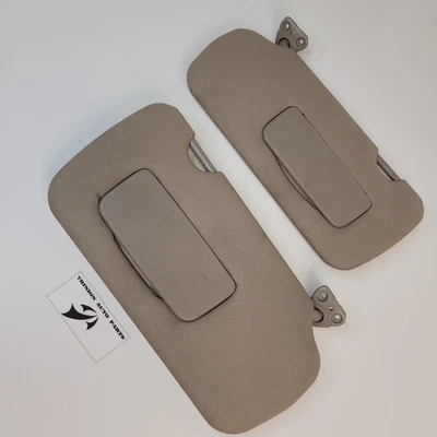 Par de parasoles Nissan Altima 2005-2006 con tela de espejo marrón juego de 2 OEM Foto 1 de 3