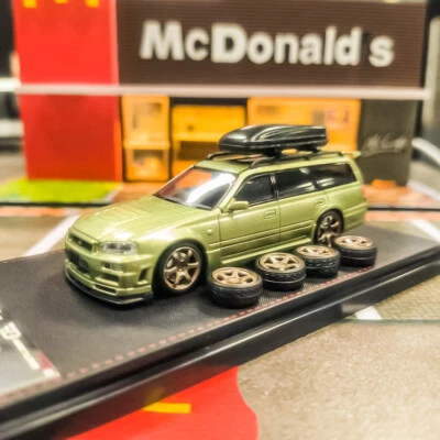 Street Weapon 1:64 JDM Nissan Stagea R34 Green Diecast Model Car with Roofbox - Image 1 of 4