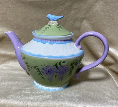 Tetera verde lavanda marfil púrpura glicinia interiores del hogar Foto 1 de 4