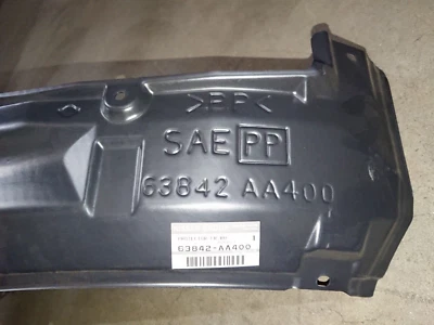 New genuine Nissan R34 Skyline GTR front guard liner - RH rear half - image 1 of 4