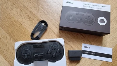 8BitDo SN30 2,4G Wireless Gamepad für Original SNES/SFC - Transparent in OVP - Bild 1 von 3