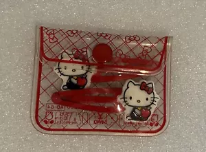 Vintage Sanrio Hello Kitty mit Apfel Haarspangen im Etui EUC - Bild 1 von 6