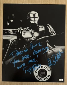 PETER WELLER SIGNED ROBOCOP WITH QUOTE 16X20 PHOTO BAS BECKETT 2 - Picture 1 of 3