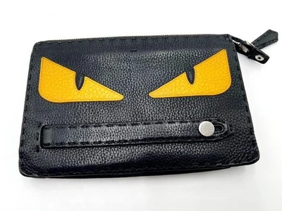 Bolso sin asas FENDI Bugs Selleria ojo de monstruo cuero negro amarillo para hombre i22443 Foto 1 de 4