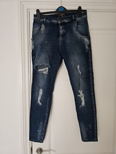 Ripped skinny jeans size W30. M  SikSilk