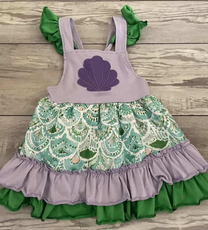 Nuevo sin etiquetas Vestido Boutique Niñas Púrpura Playa Concha 12-18M Sirena Niño Iglesia 2 Foto 1 de 3