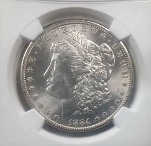 1884 O Morgan Silver Dollar L MS 63 - Picture 1 of 4