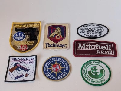 Parche surtido de armas de fuego de tiro 7 parches sin usar - Beretta, Pachmayr, Mitchell Foto 1 de 4
