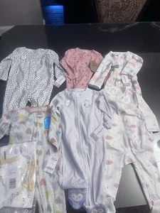 Carter’s Baby Girl Bundle of Sleepers - 7 Pairs of Footie Pajamas, 9 Months - Picture 1 of 3