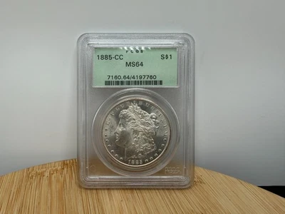 1885-CC $1 MORGAN DOLLAR - PCGS MS-64 GREEN HOLDER! CARSON CITY (CASE DAMAGE) - Image 1 of 4