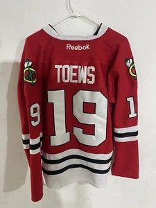 Jersey cosido Reebok para hombre NHL C Chicago Blackhawks Jonathan Toews rojo XL 48 - Imagen 1 de 3