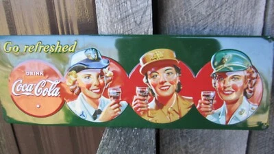 Coca-Cola 3-D Embossed Tin Sign Women of the Military Go Refreshed - Image 1 of 4