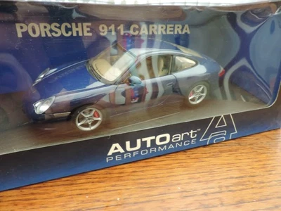 PORSCHE 911 CARRERA 4 COUPE TYPE 996 BLEUE AUTOART 1/18 - Photo 1/4