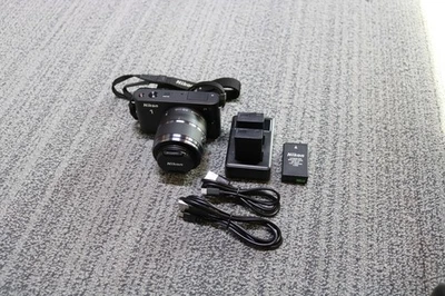 Nikon 1 J1 Mirrorless Digital Camera with Nikon VR 30-110 Lens  - SC: 1226 - Image 1 of 4