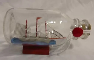 Ship Model in a bottle with 12 Sails and 3 Masts on Display Stand - Picture 1 of 5