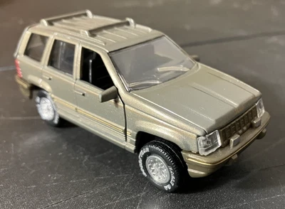 Jeep Grand Cherokee 1995 Road Champs escala 1/43 diecast Foto 1 de 4
