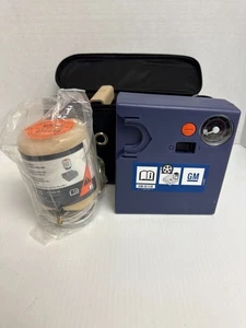 GM Tire Air Compressor With Sealant #13392204 OEM(NEW) case included  - Picture 1 of 4