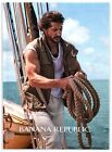 2022 Banana Republic Print Ad, Sailor On Boat Ocean Muscles Vest Rope Sky Clouds