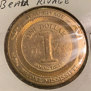 Ficha de 1 dólar para juegos de colección ~ Casino Beau Rivage de latón ~ Biloxi Mississippi - Imagen 1 de 2