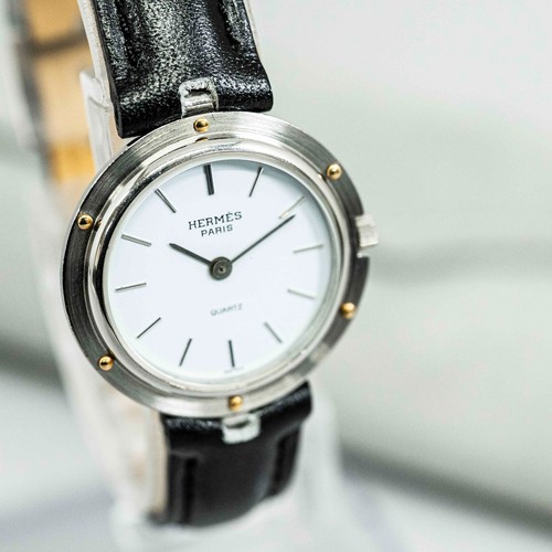HERMÈS *QUASI NUOVO con custodia* HERMES Paris quarzo bianco quadrante ragno Swiss Made 26 mm donna