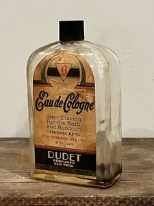 VINTAGE EAU DE COLOGNE DUDET PERFUMER NEW YORK GLASS PRIMITIVE 16OZ BOTTLE (20C) - Picture 1 of 5