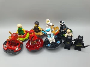 Lego Ninjago 7 Spinner Kreisel mit Figuren + Batman teils mit Zubehör ✅ - Bild 1 von 8
