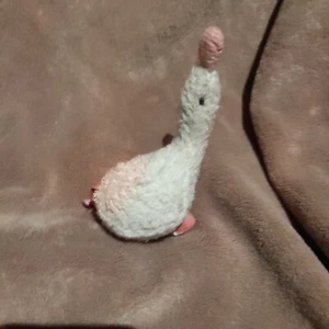 Sigikid Gans Stofftier Schmusetier Ente kuscheltier schnabel mit rassel - Bild 1 von 2