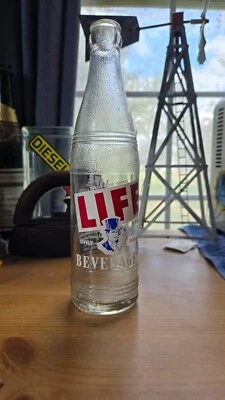 Life Brand 12oz Glass Bottle Good Condition Life Beverage Co Cedar Rapids Iowa - Image 1 of 4