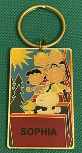 Peanuts Cartoon “Sophia” Metal Gold Tone KeyChain KeyRing Key Holder - Picture 1 of 5