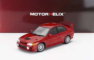 Motorhelix 1/18 Mitsubishi Lancer Evo IV mit Motor 1999 rot M84004 - Bild 1 von 18