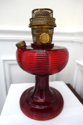 Rare Early Ruby Red Beehive Aladdin Oil Lamp Model B Burner With A Cadmium Glow - Image 1 of 4