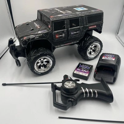 RC ferngesteuertes Modell der Marke Nikko Hummer American Express LESEN - Bild 1 von 4