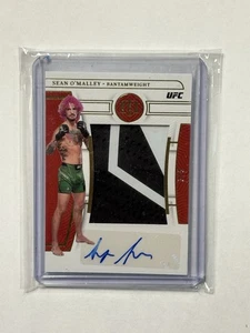 2023 Panini Chronicles National Treasures Sean O’Malley /5 Auto Patch - Bild 1 von 2