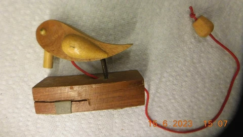 Wooden hand carved bird door knocker vintage Cover