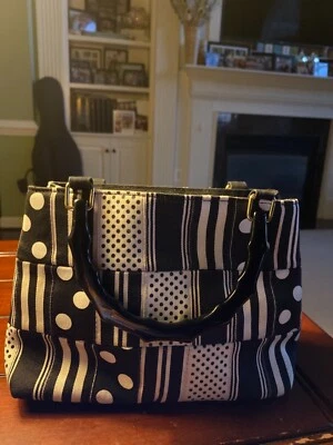 VINTAGE TIANNL WOMENS HANDBAG/PURSE BLACK AND WHITE COTTON WITH COOL LUCITE HAND - Image 1 of 4