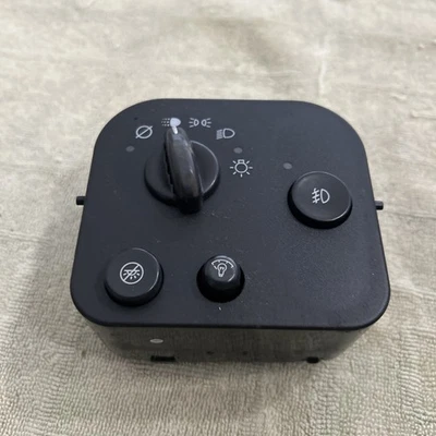 Interruptor de luz antiniebla de cabezal de faros de tablero OEM 02-09 GMC Envoy Chevrolet Trailblazer Foto 1 de 2