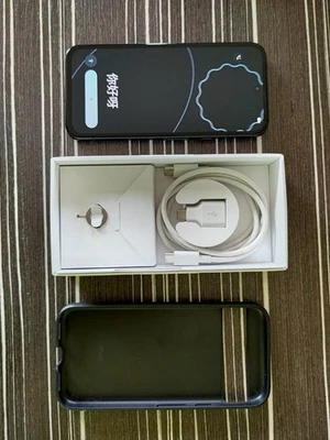 Google Pixel 8a (noir) - Bon état - Dans sa boîte avec accessoires + Coque  - Photo 1/4