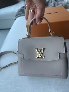 Louis Vuitton LockMe Ever Mini Calf Leather Greige (M21052) BRAND NEW W/ TAGS - Picture 1 of 12