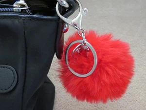 Porte clés Bijou de sac pompon fourrure rouge breloque Aztèques soleil - Imagen 1 de 3