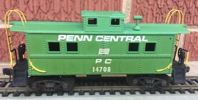 CUSTOM HO - Penn Central - 4 Window Caboose  PC 14708 KD's light weathering - Image 1 of 4