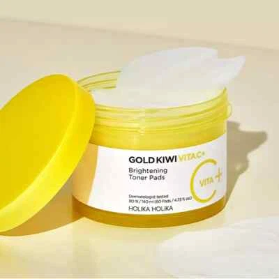 Almohadillas tónicas iluminadoras Holika Holika Gold Kiwi Vita C+ 140 ml (80 almohadillas) Foto 1 de 3