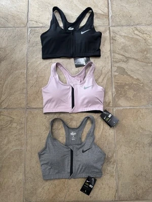 3 PARES DE SUJETADORES DEPORTIVOS NIKE PRO COMBAT DRI-FIT DELANTEROS CON CREMALLERA PARA MUJER TALLA L Foto 1 de 2