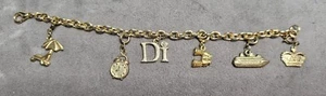 Di BETTELARMBAND 7-1/4"L GOLDFARBEN mit 6 CHARMS  - Bild 1 von 4