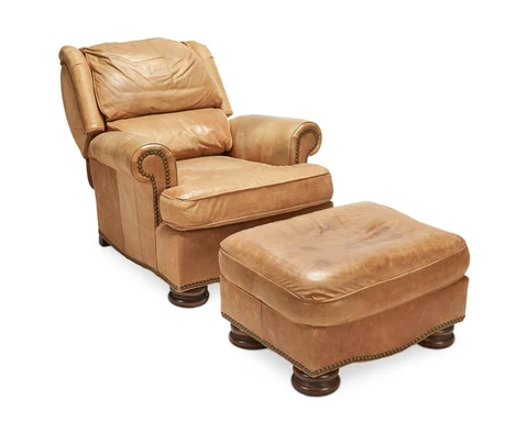 A contemporary Drexel Heritage leather club chair with ottoman Cover