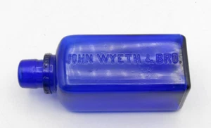 VINTAGE COBALT GLASS "JOHN WYETH & BRO." MEDICINE BOTTLE (NO TOP CAP) - Picture 1 of 3
