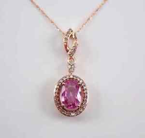 2Ct Oval Cut Lab Created Pink Sapphire Halo Pendant 14K Yellow Gold Plated Chain