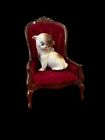 Kewpie Rare Doodle Dog Rose O'Neill taches marquées marron assis sur une chaise