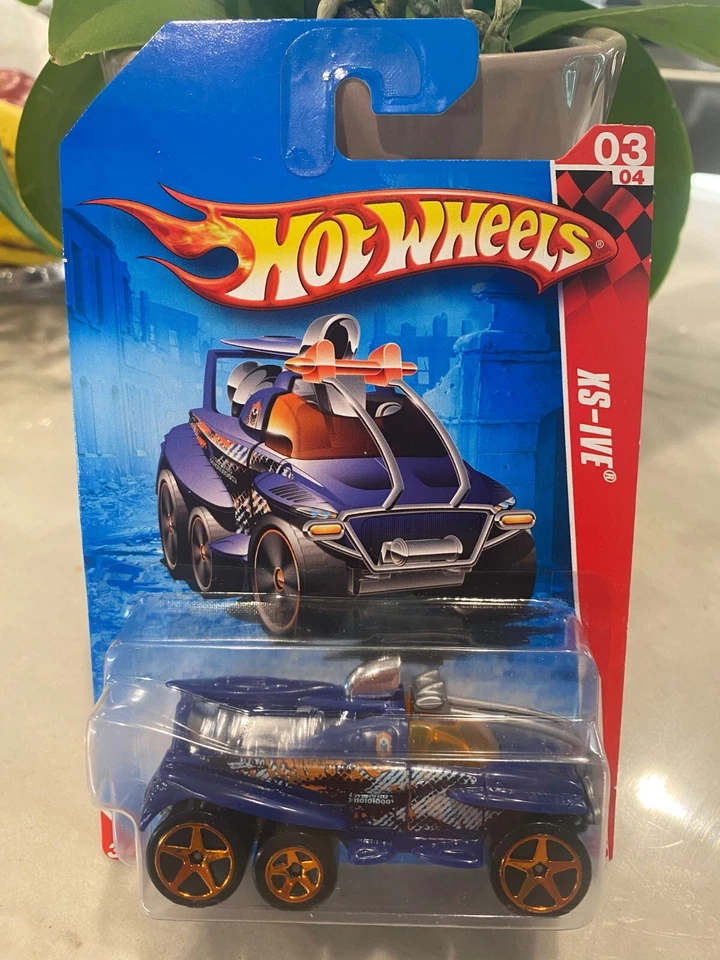 2010 Hot Wheels #199 Carrera World-Battle 3/4 XS-IVE Azul Con / Cobre 5 Rayos - Imagen 1 de 1